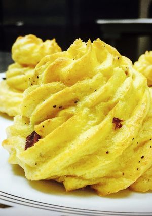 A picture of Bacon Cheddar Duchess Potatoes.