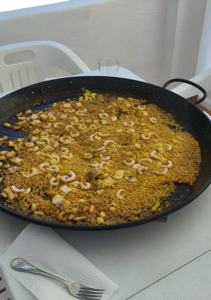 Una foto de Arroz a banda