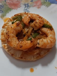Una foto de Pincho de langostinos