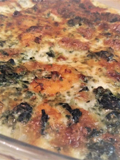 Une photo de Gratin Crevettes Epinards Mozzarella