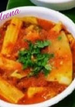 A picture of Broccoli BABY CORN ZUCCHINI IN RED CAPSICUM (Bellpeppers)GRAVY.