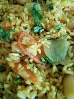 Una foto de Biryani (arroz con especias y verdura)