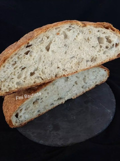 Una foto de Pan con cebolla y nueces macadamia
