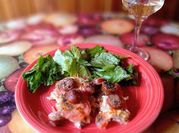Una foto de pescado al horno tomate