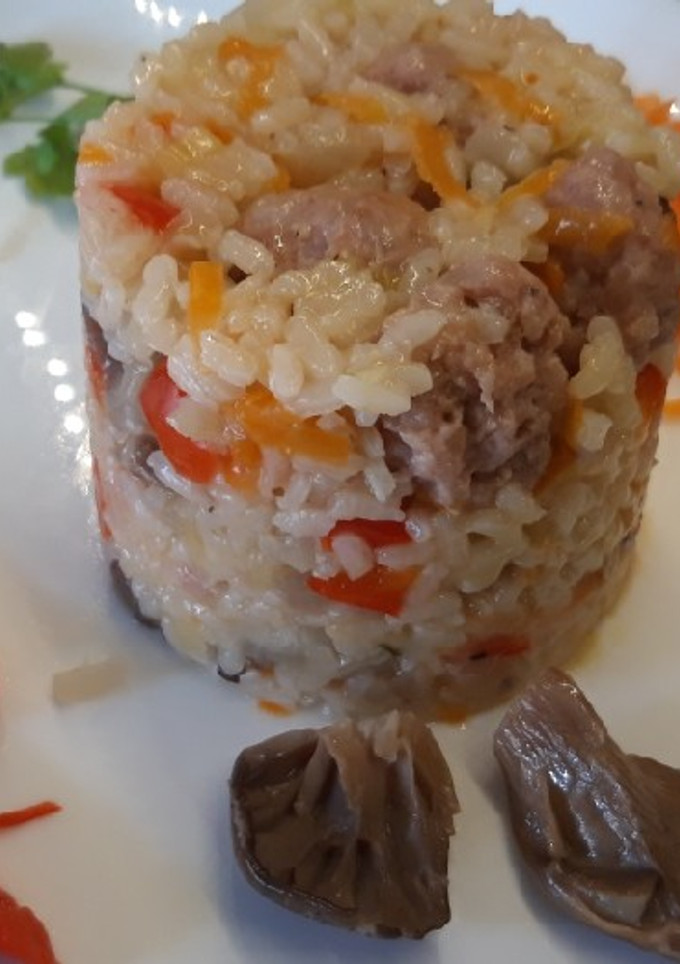 Una foto de Arroz con Setas y Butifarra