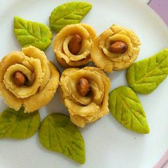 A picture of Gram flour cookies in rose shape.