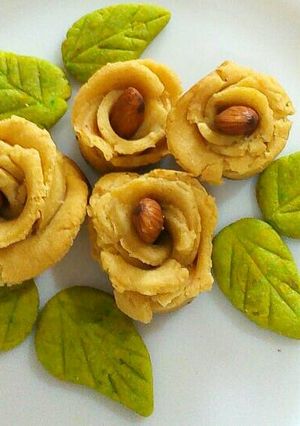 A picture of Gram flour cookies in rose shape.