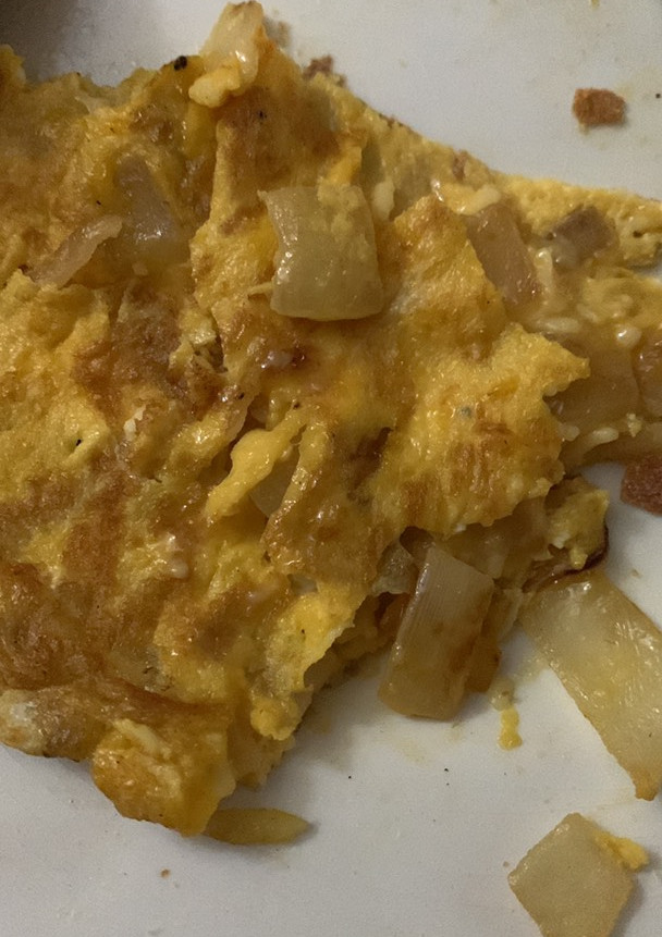 Una foto de Tortilla francesa con cebolla a la española