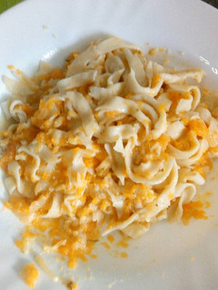 Una foto de Pasta fresca con calabaza, cebolla caramelizada y queso de cabra