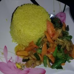 A picture of Veggies with turmeric rice.