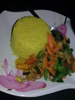 A picture of Veggies with turmeric rice.