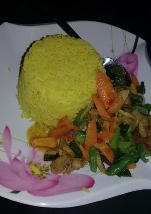 A picture of Veggies with turmeric rice.