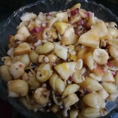 A picture of Bazarii Macroni spaghetti chana fruit chaat.