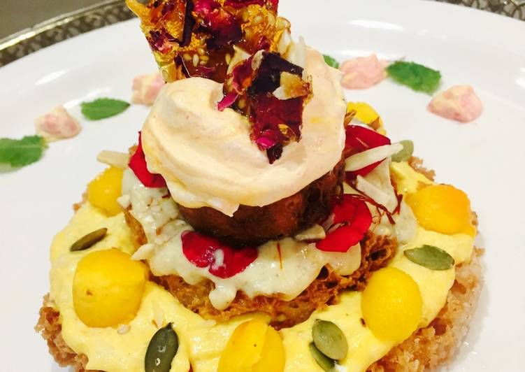Recipe: Tasty Ghewar cake with gulkand and mango rabdi mousse
