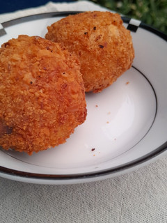 Una foto de Bombas de papa rellenas de queso