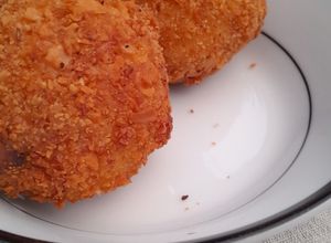 Una foto de Bombas de papa rellenas de queso