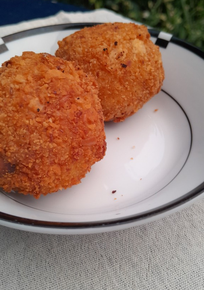 Una foto de Bombas de papa rellenas de queso