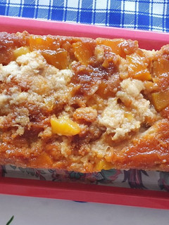 Una foto de Budín de pan con durazno 🍑🍑