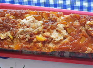 Una foto de Budín de pan con durazno 🍑🍑