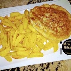 A picture of Chips with fry egg.
