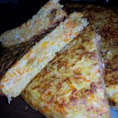 A picture of Tortilla de zanahoria y papas.