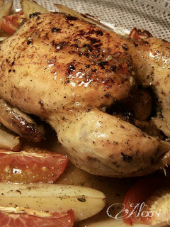 Una foto de Pollo asado al limón y laurel