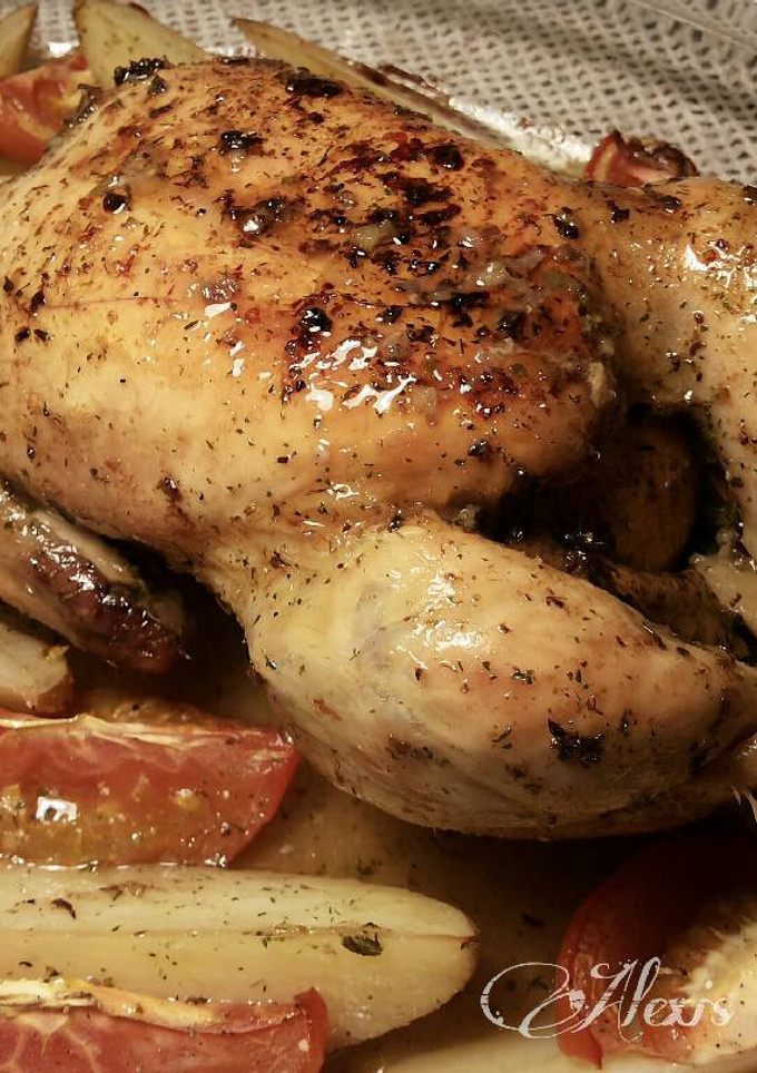 Una foto de Pollo asado al limón y laurel
