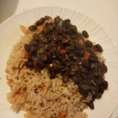 A picture of Fried Rice with black eyed peas.