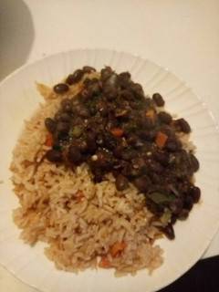 A picture of Fried Rice with black eyed peas.