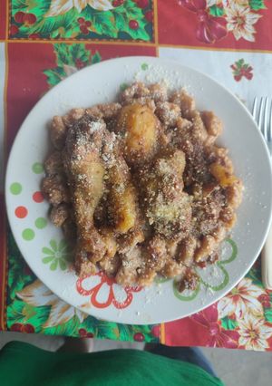 Una foto de Ñoquis de zanahoria con salsa de pollo heterei