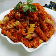Cheesey spiral Pasta in red sauce A picture of Cheesey spiral Pasta in red sauce.
