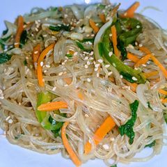 A picture of Jap Chae (stir fried sweet potato glass noodles).