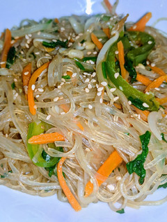A picture of Jap Chae (stir fried sweet potato glass noodles).