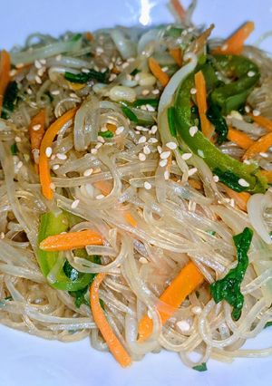 A picture of Jap Chae (stir fried sweet potato glass noodles).