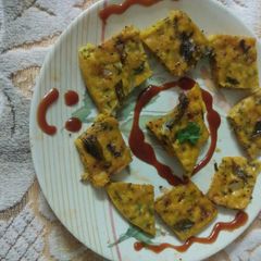 A picture of Veg. Dhokla with poha.