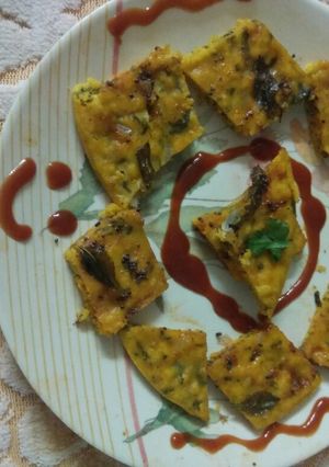 A picture of Veg. Dhokla with poha.