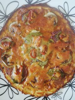 Una foto de Pizza fit sin harina con base de coliflor