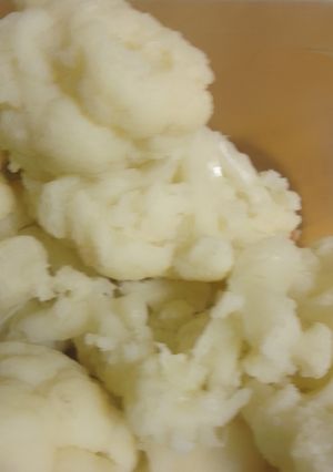 Una foto de Coliflor con patatas y refrito