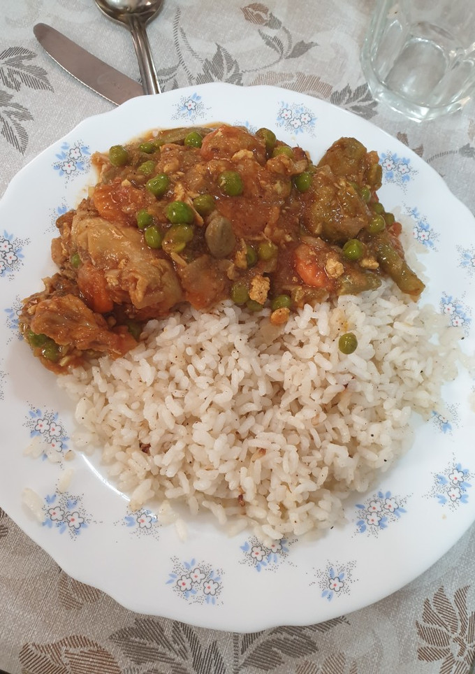 Una foto de Arroz con pollo 🐔