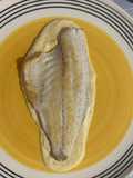 Filete de lubina con crema de palomitas a la mantequilla
