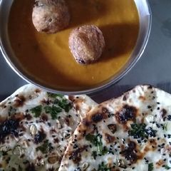Malai kofta and Garlic Naan A picture of Malai kofta and Garlic Naan.