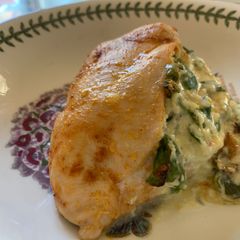 A picture of Spinach stuffed chicken breast.