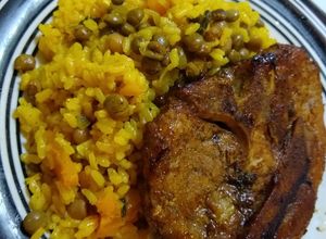 Una foto de Moro de guandule con Auyama y filete de cerdo