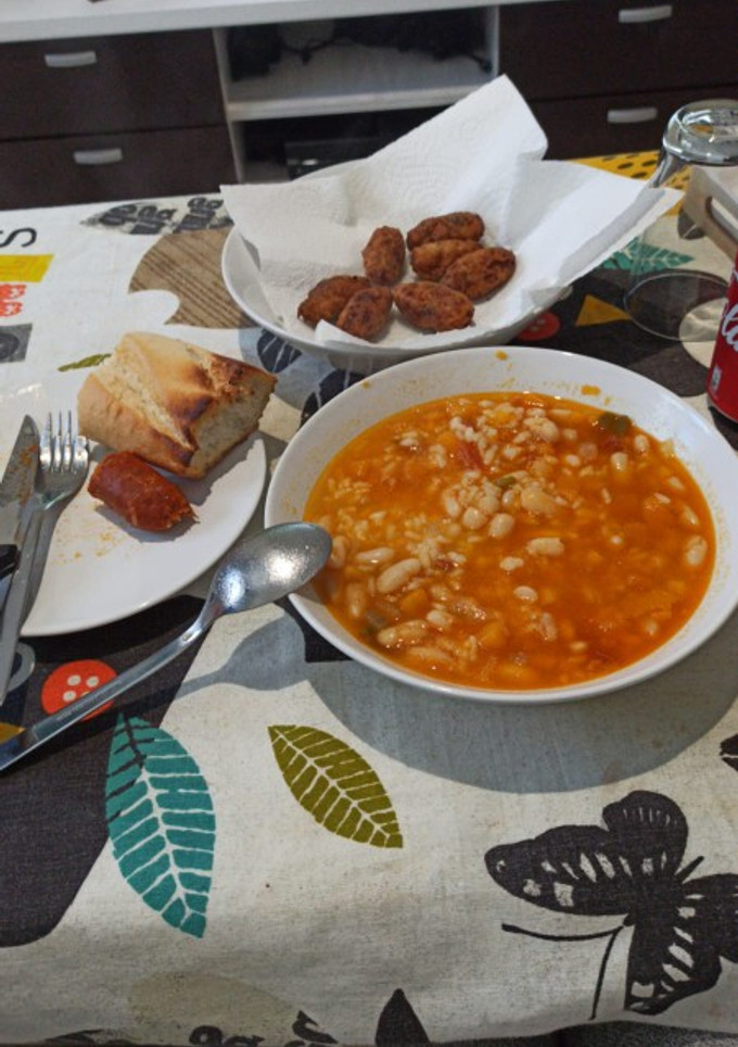 Una foto de Habichuelas con calabaza y arroz
