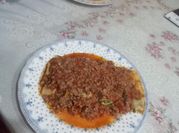 Una foto de relleno de acelga con pate