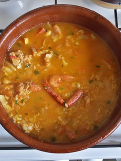 Una foto de Arroz caldoso de pescado y marisco como le gustaba a mi madre