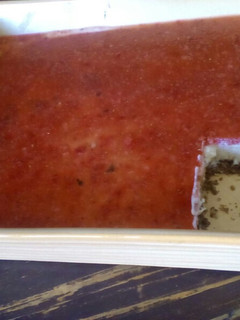 A picture of Vanilla Cheesecake with Strawberry Purée Topping.