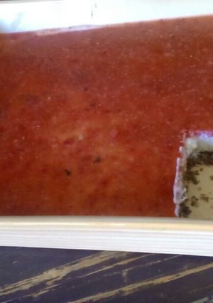 A picture of Vanilla Cheesecake with Strawberry Purée Topping.