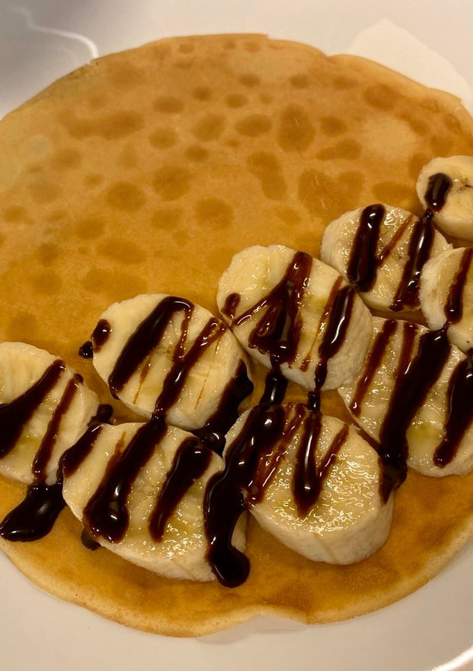 Una foto de Crepes sin lactosa con plátano y chocolate negro