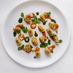 A picture of Cauliflower Gnocchi with Creamy Tikka Masala and Mint Chutney:.
